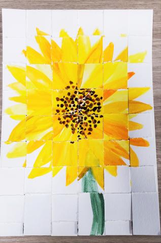 Woven paper depicting yellow watercolor sunflower