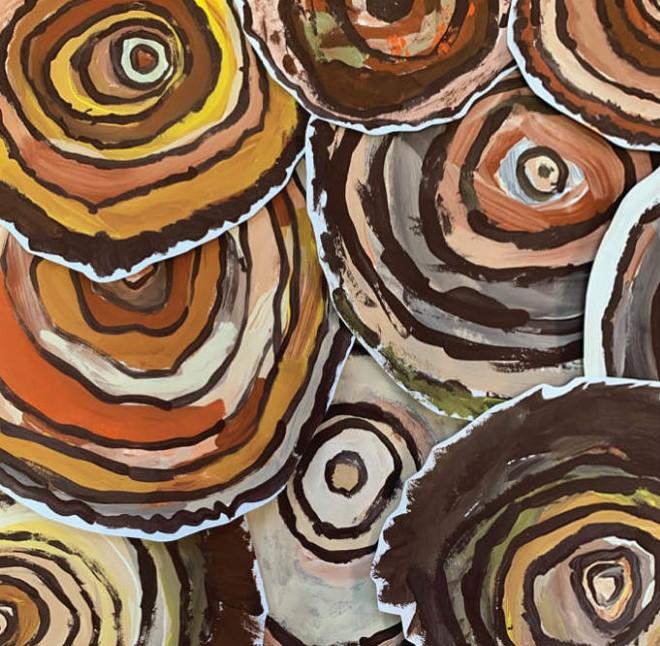 Painted tree trunks on paper